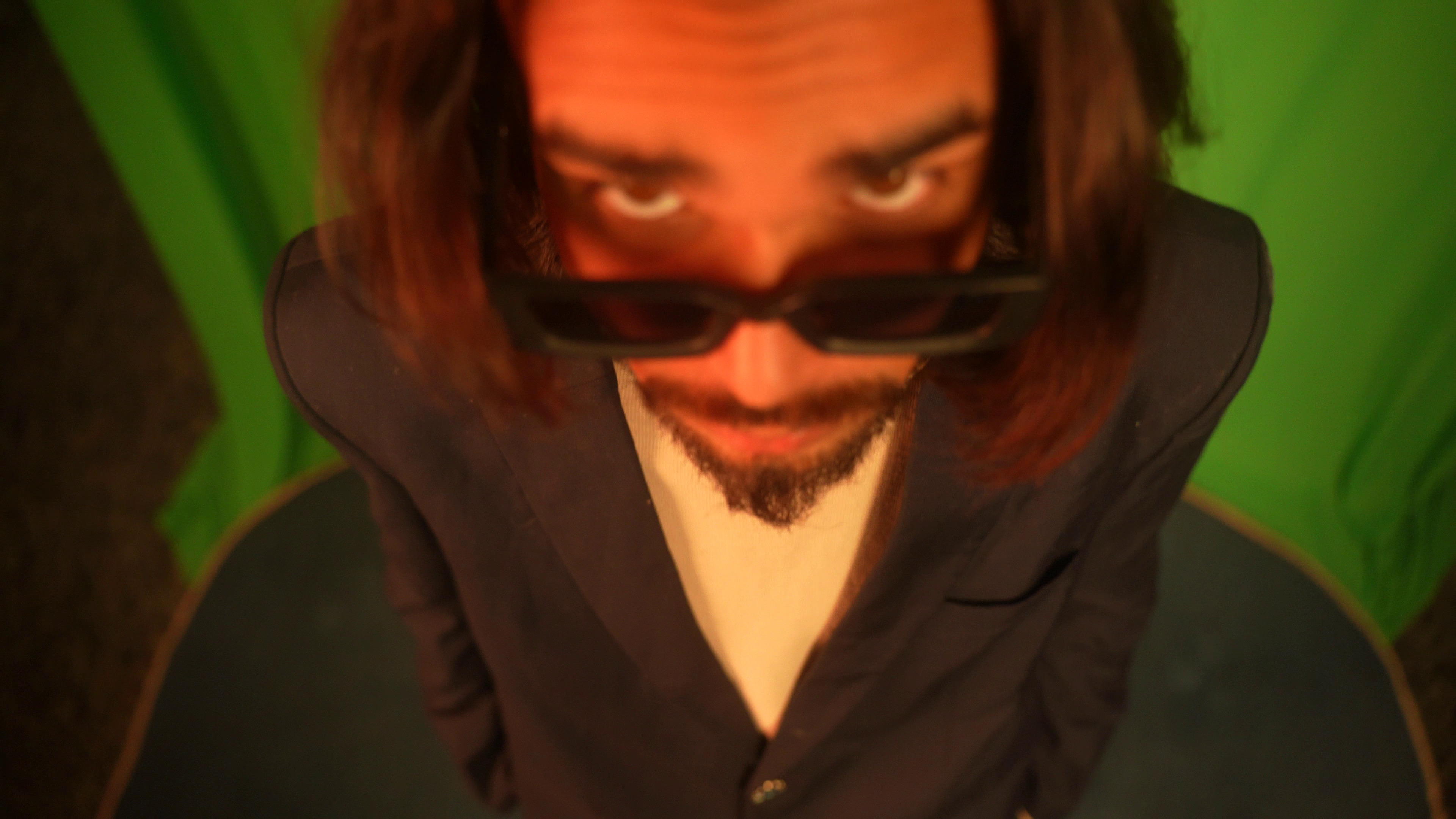 Faraz OG extreme close-up — Zaban Hai video shoot portrait