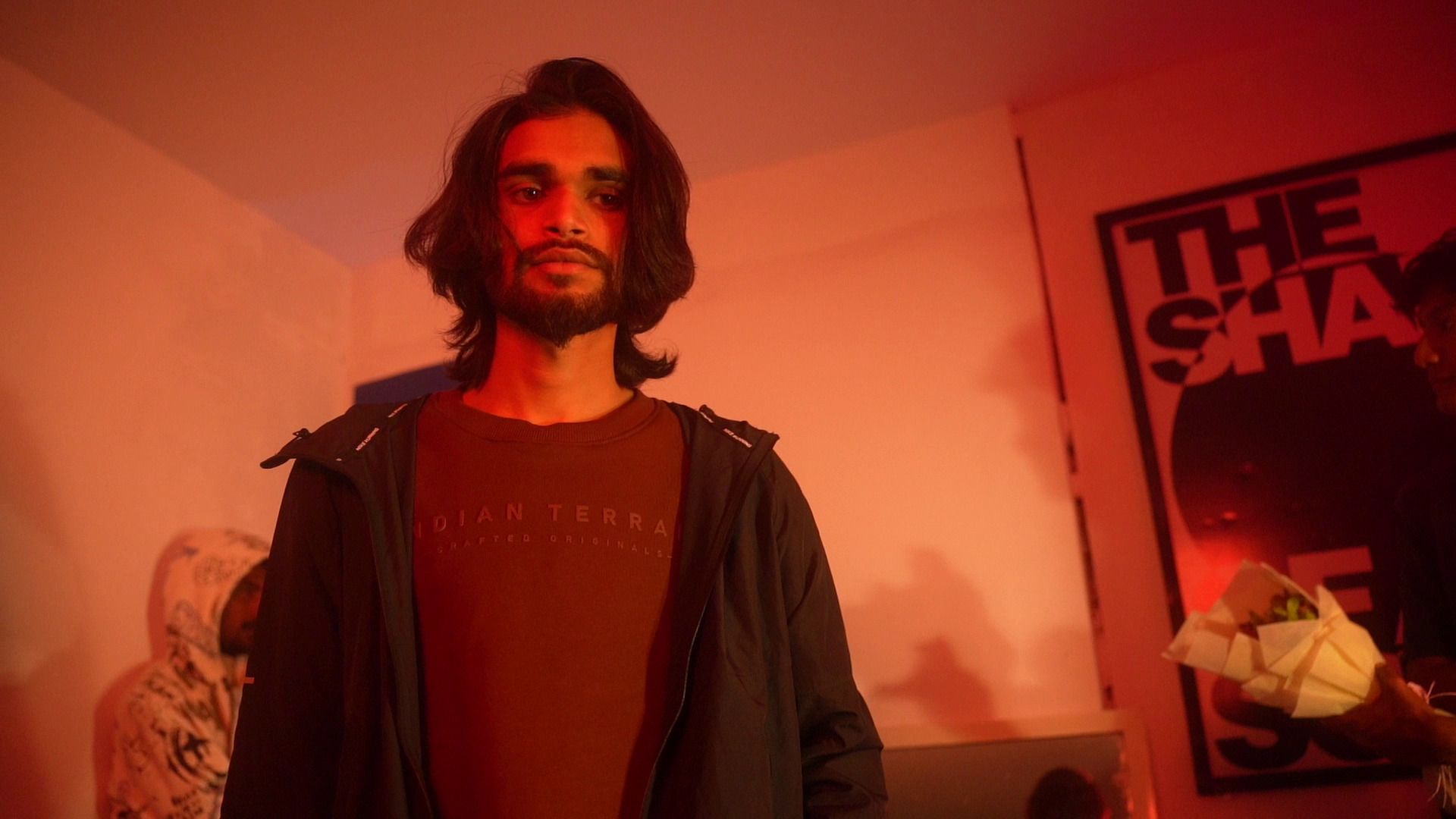 Faraz OG headshot on set — Zaban Hai video BTS frame 134