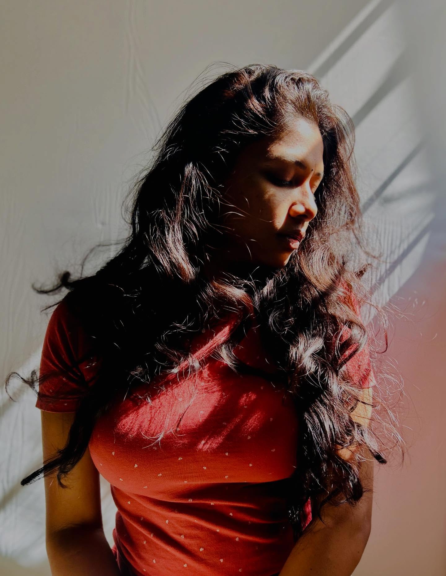 Sai Prasanna — sunlight, red top